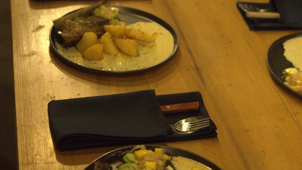 Fusion BBQ plates set over open fire